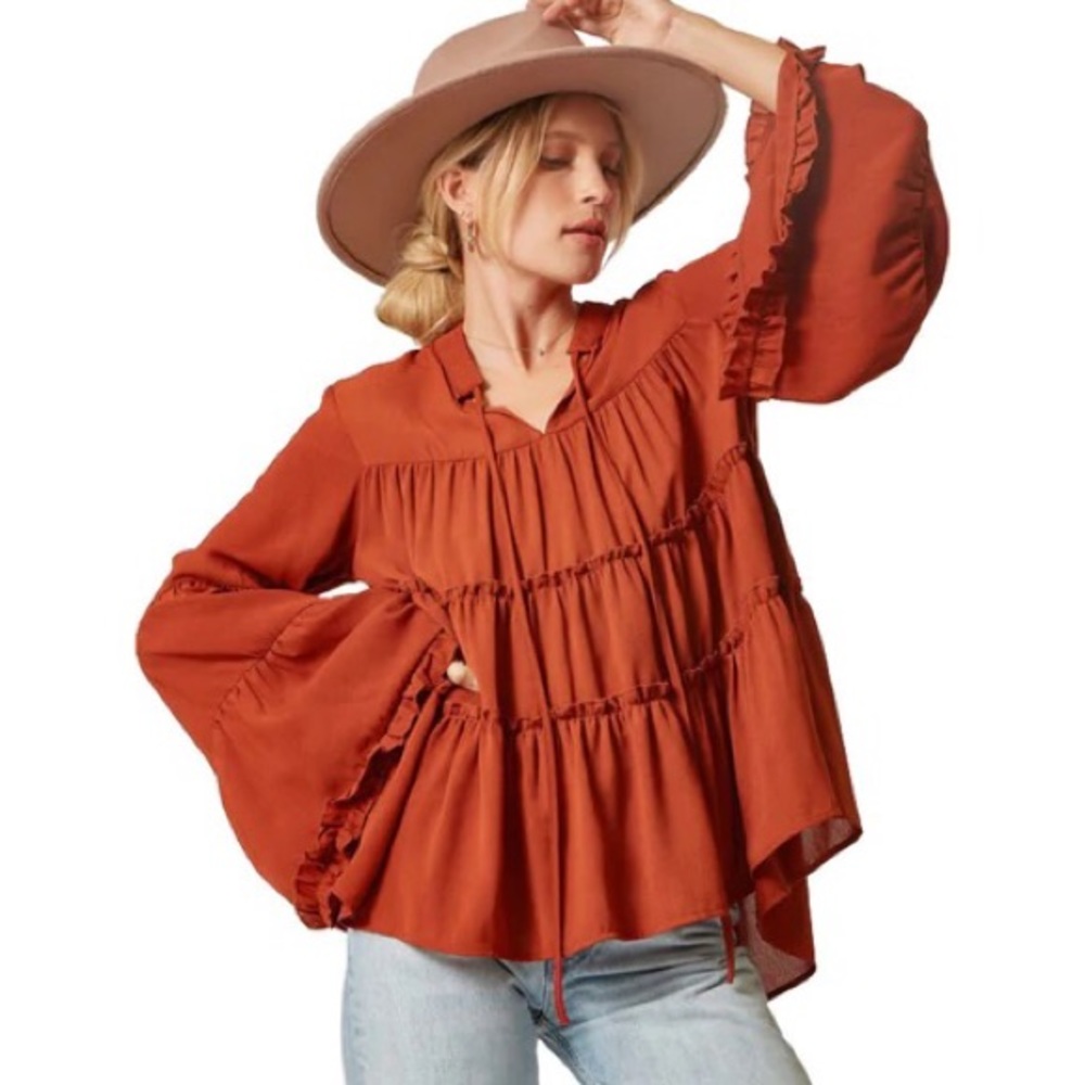 New with tags long sleeve blouse. Size 1X fits oversized, flowy
